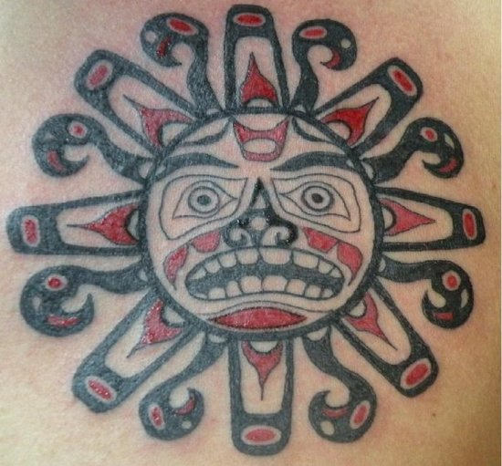 Black And Red Ink Taino Sun Tattoo