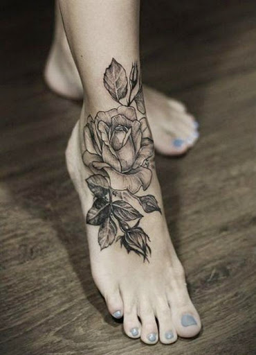 Black And White Floral Tattoo On Girl Foot