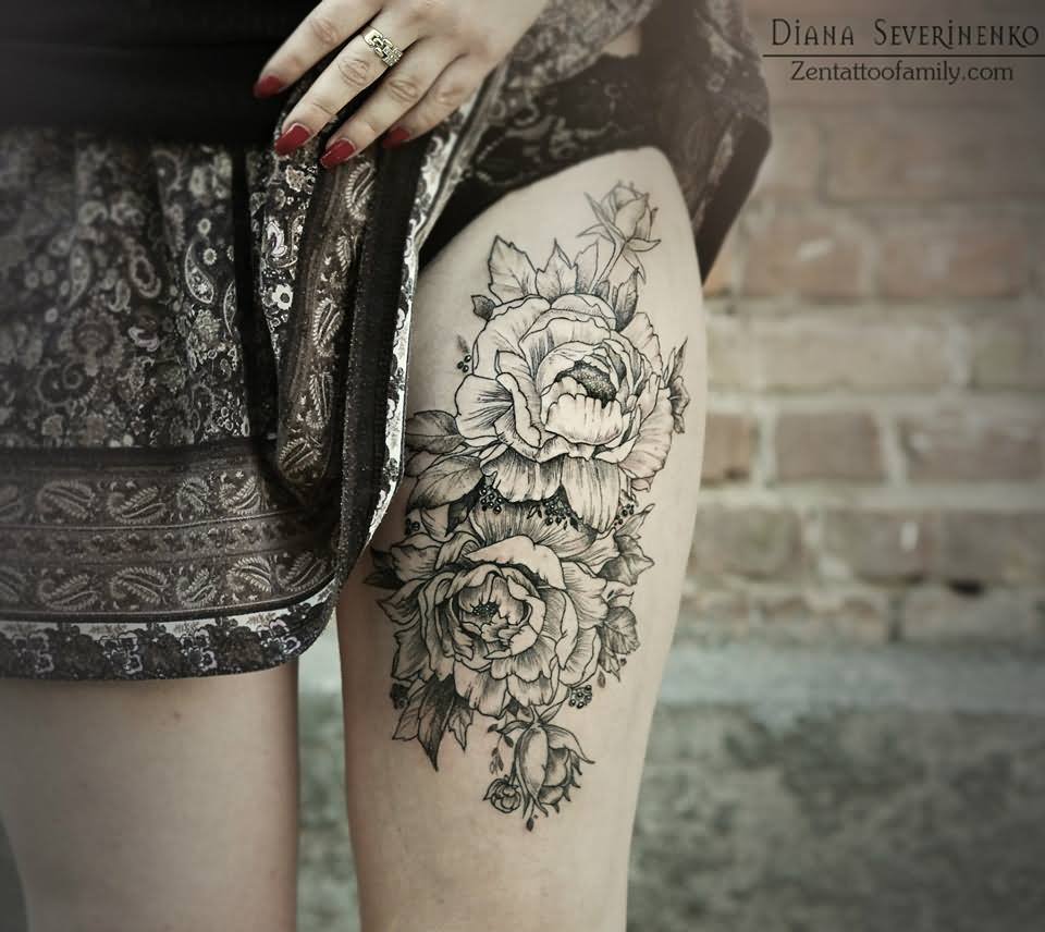 Black And White Floral Tattoo On Girl Left Thigh