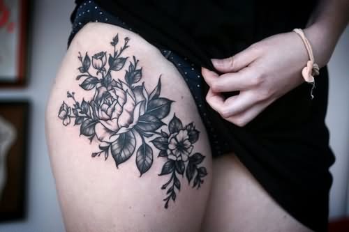 Black And White Floral Tattoo On Girl Thigh