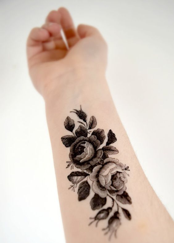 Black And White Floral Tattoo On Right Forearm