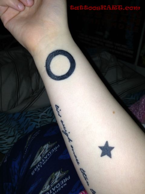 Black Circle And Star Tattoo On Forearm
