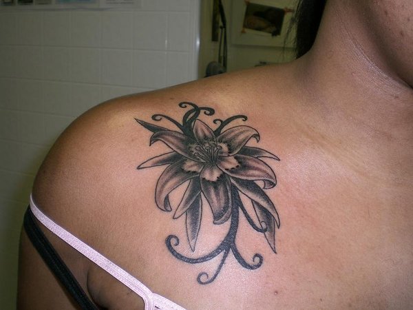 Black Ink Floral Tattoo On Right Front Shoulder