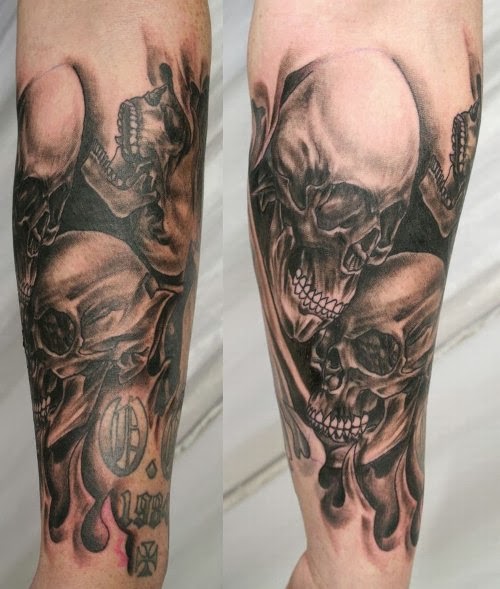 Black Ink Halloween Skull Tattoo Design For Forearm