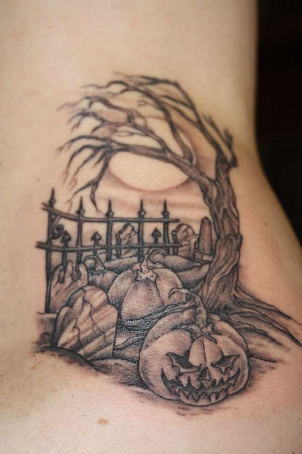 Black Ink Halloween Tree With Pumpkin Tattoo Design