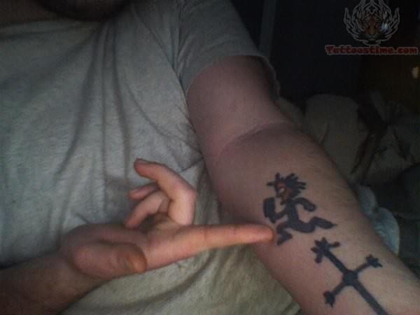 Black Ink Juggalo Tattoo On Left Forearm