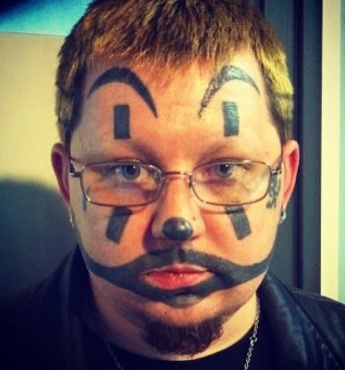 Black Ink Juggalo Tattoo On Man Face