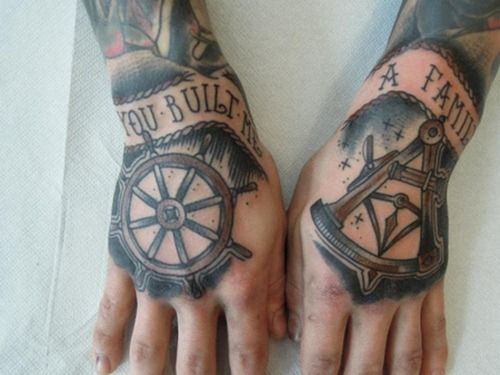 Black Ink Sailor Wheel Tattoo On Hand