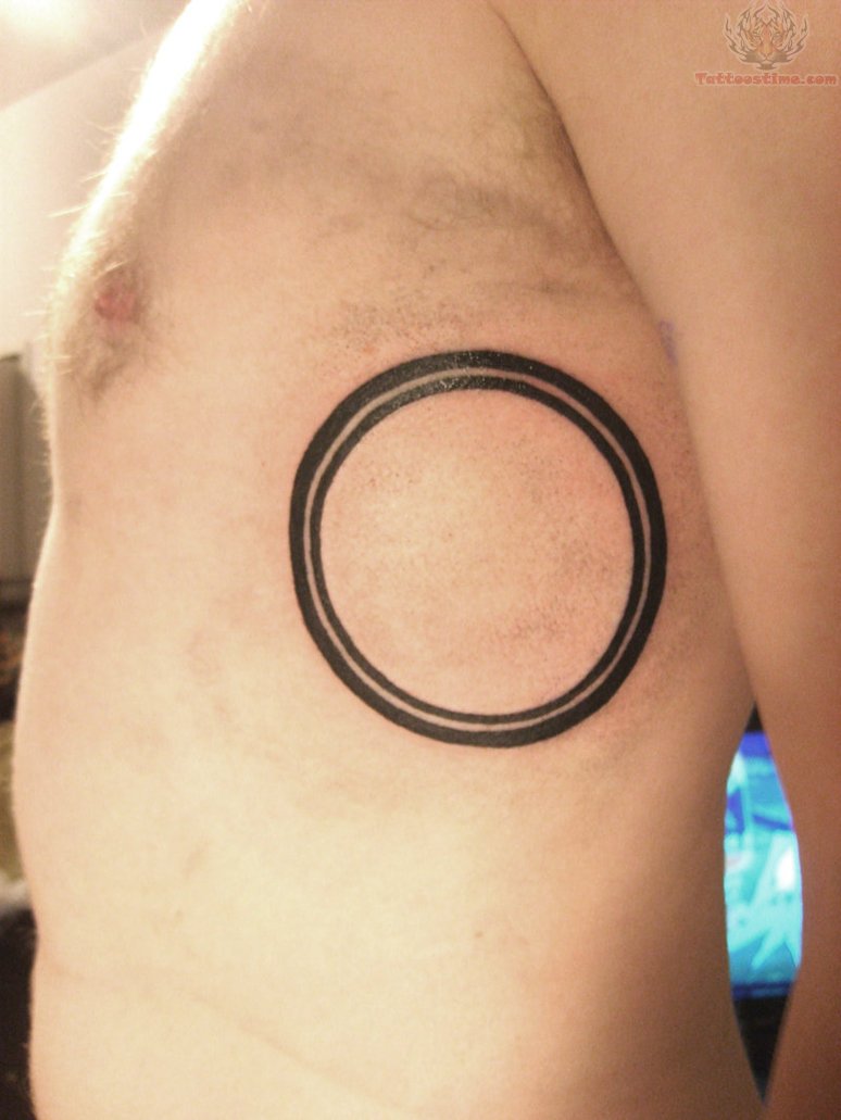 Black Outline Two Circle Tattoo On Man Side Rib