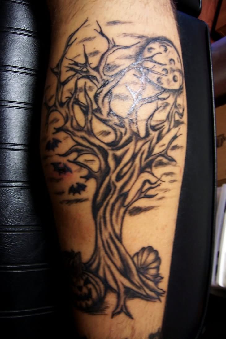 Black Tribal Halloween Tree Tattoo Design For Leg
