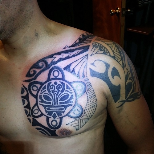 Black Tribal Taino Sun Tattoo On Chest For Men
