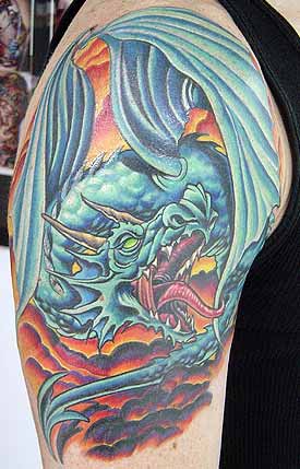Blue Ink Fantasy Dragon Tattoo On Half Sleeve