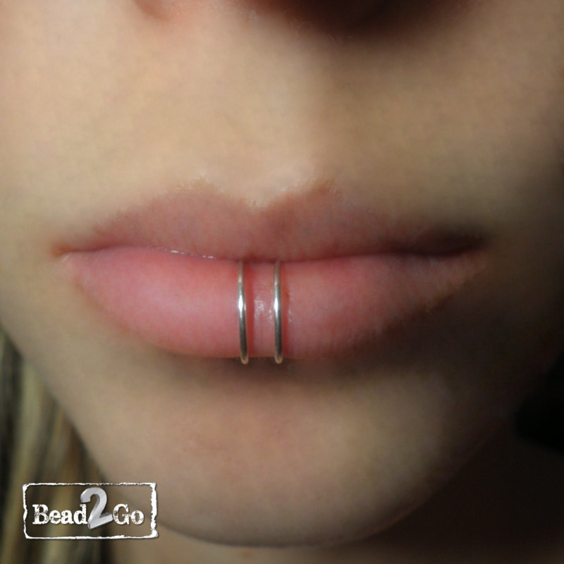 Center Labret Piercing With Double Silver Ring
