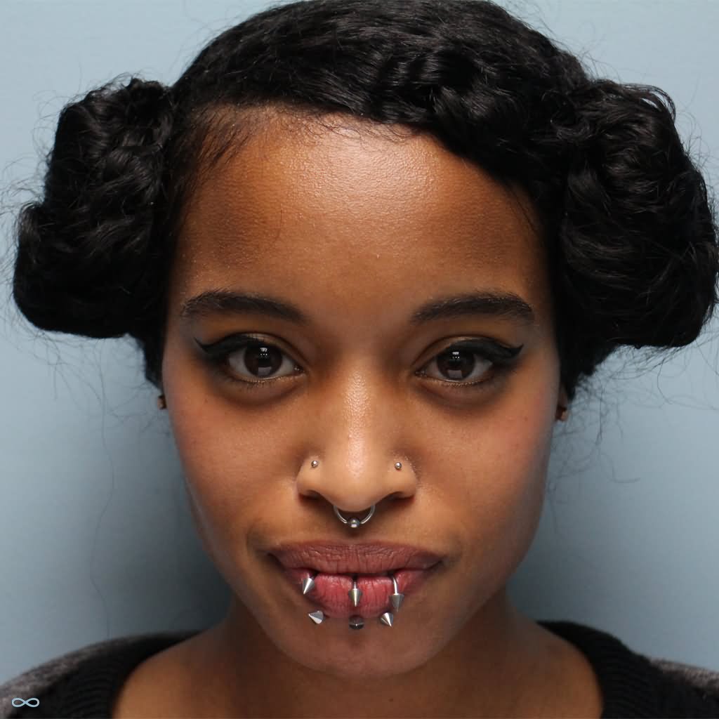 Center Labret Piercing With Silver Cone Piercing