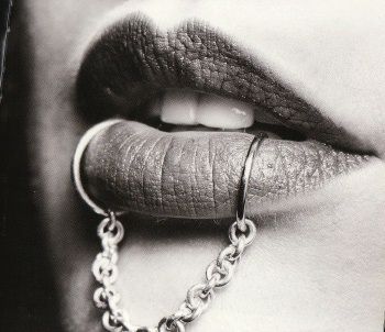 Chain Piercing On Girl Lower Lip