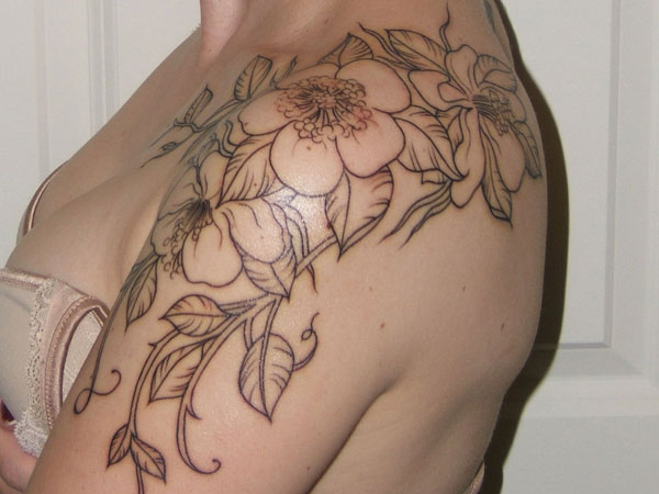 Classic Black Outline Floral Tattoo On Girl Left Shoulder