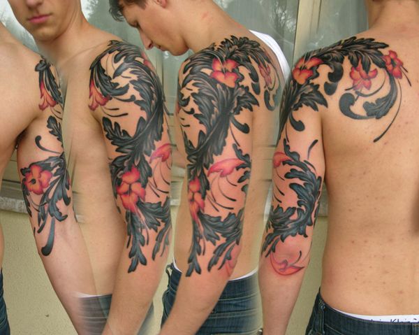 Classic Floral Tattoo On Man Left Half Sleeve