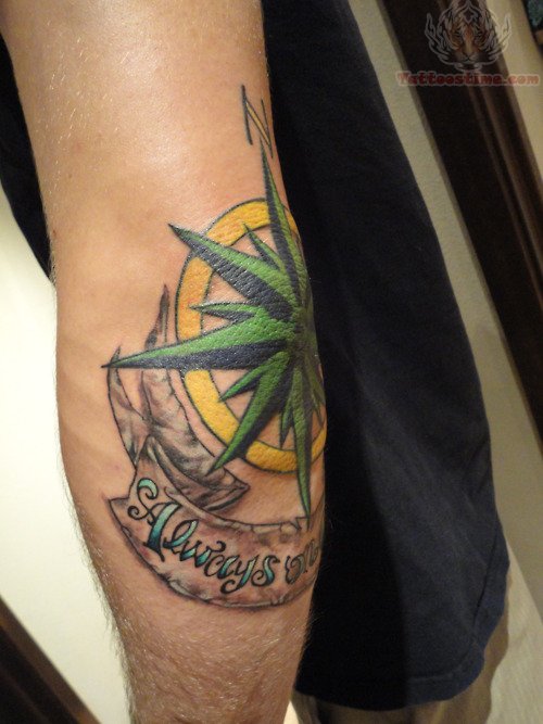 Colorful Compass With Banner Tattoo On Elbow