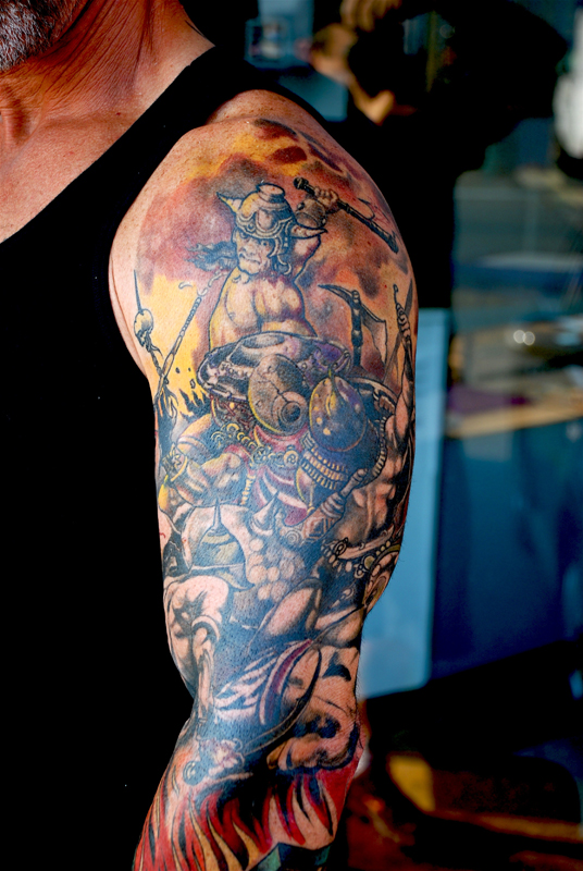 Colorful Fantasy Tattoo On Left Sleeve