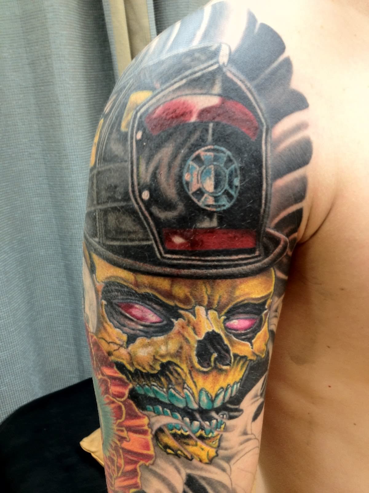 Colorful Firefighter Helmet On Skull Tattoo On Man Right Half Sleeve