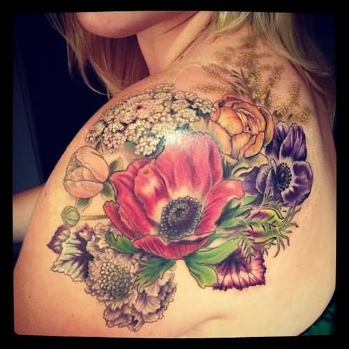 Colorful Floral Tattoo On Girl Left Shoulder