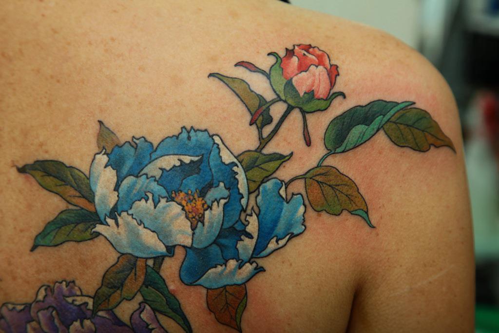 Colorful Floral Tattoo On Right Back Shoulder