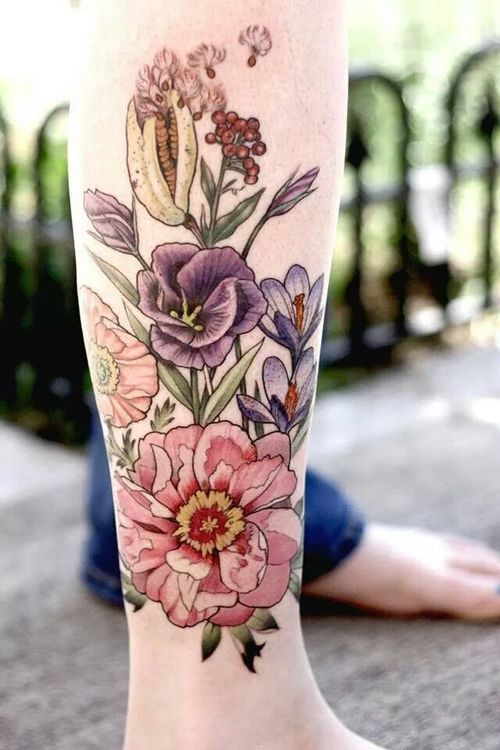 Colorful Floral Tattoo On Right Leg