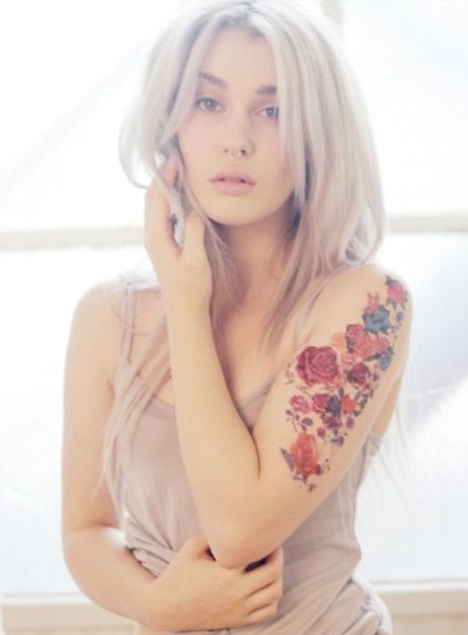 Colorful Realistic Floral Tattoo On Girl Left Arm