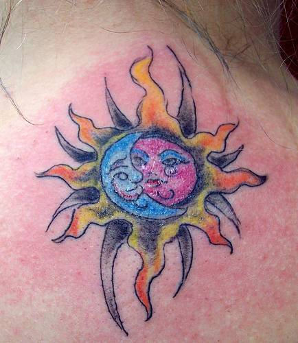 Colorful Taino Sun Tattoo On Upper Back
