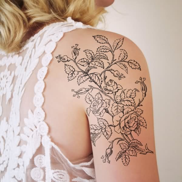 Cool Black And White Floral Tattoo On Girl Right Shoulder