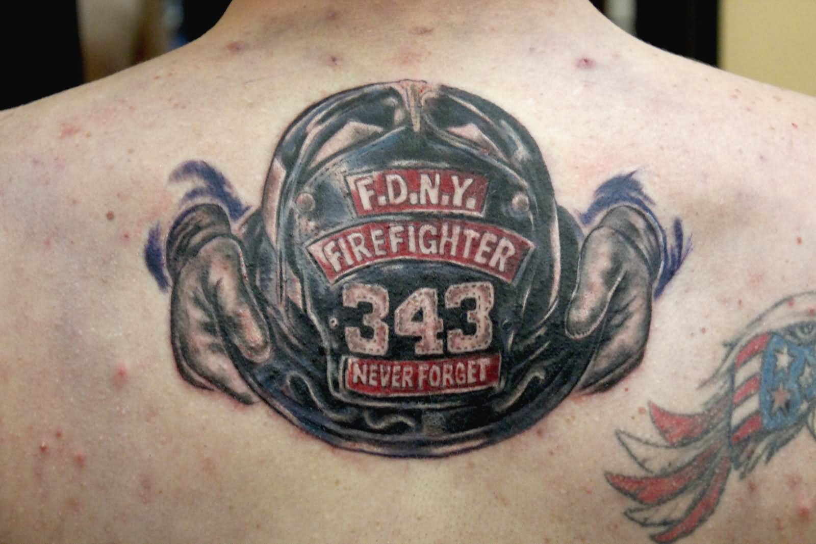 Cool Firefighter Helmet Tattoo On Upper Back