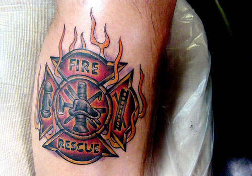 Cool Firefighter Logo In Flame Tattoo Design