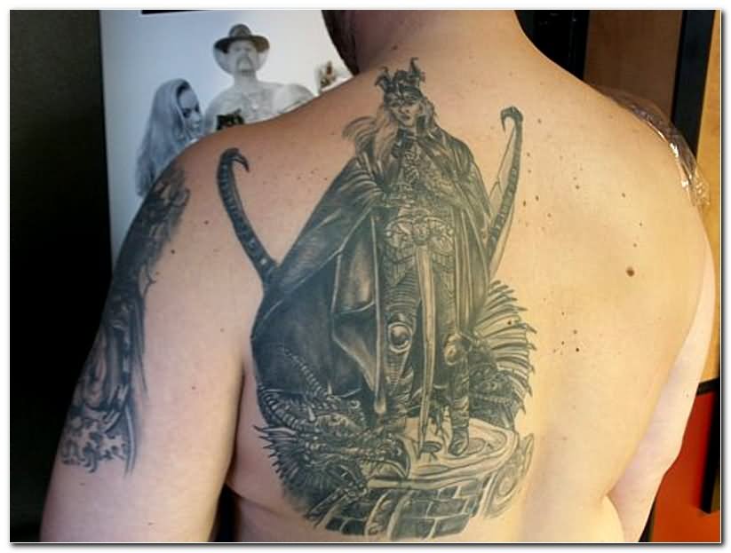 Dark Grey Ink Final Fantasy Tattoo On Left Back Shoulder