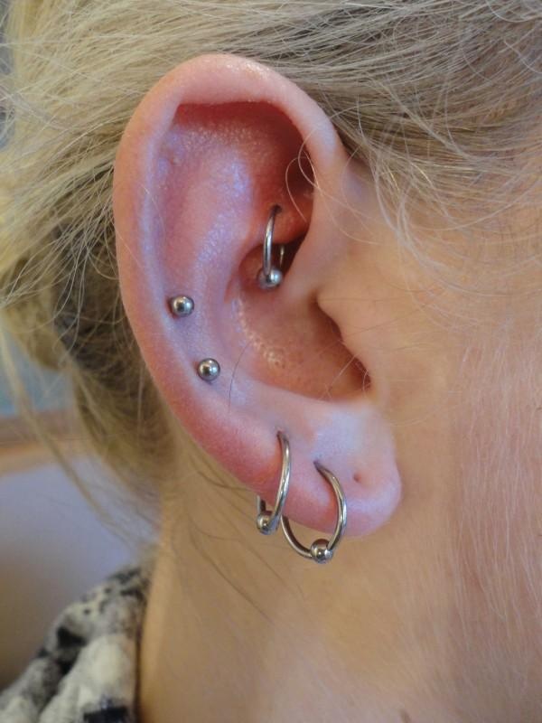 Double Lobe And Auricle Piercing On Right Ear For Girls