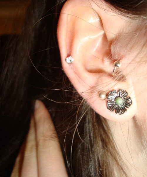 Dual Lobes Auricle Piercing On Girl Right Ear