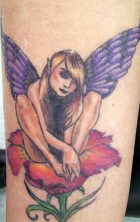 Fantasy Fairy On Flower Tattoo On Bicep