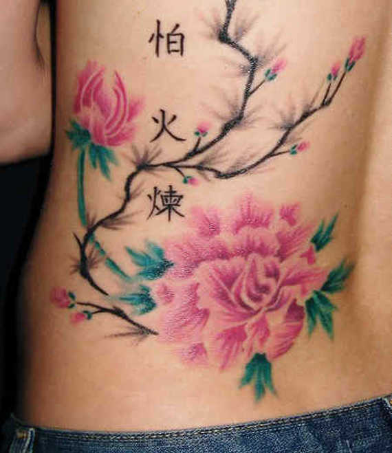 Fantasy Flower Tattoo On Lower Back