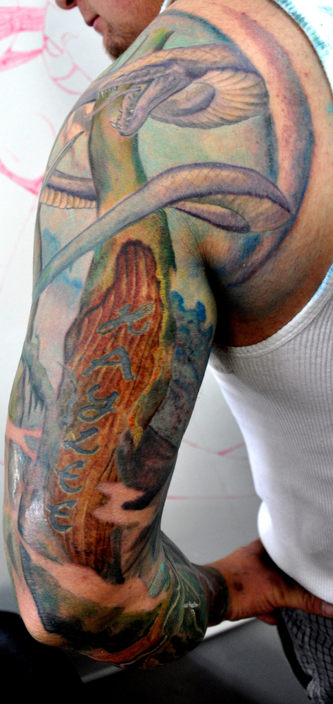 Fantasy Tattoo On Man Left Half Sleeve