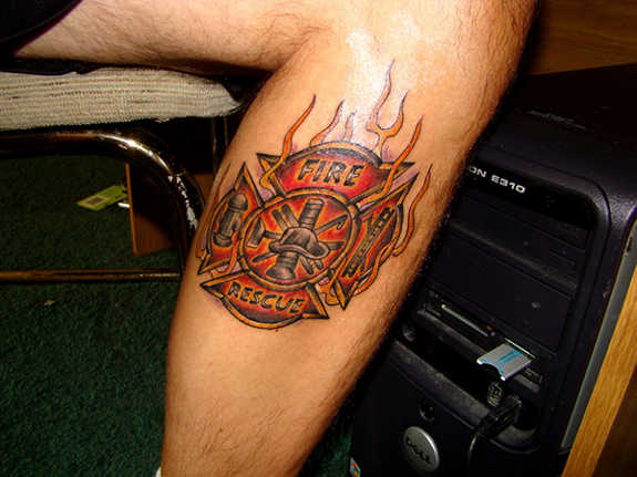 Firefighter Cross Tattoo On Leg Calf