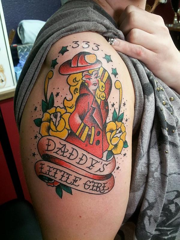 Firefighter Girl With Banner Tattoo On Right Shoulder