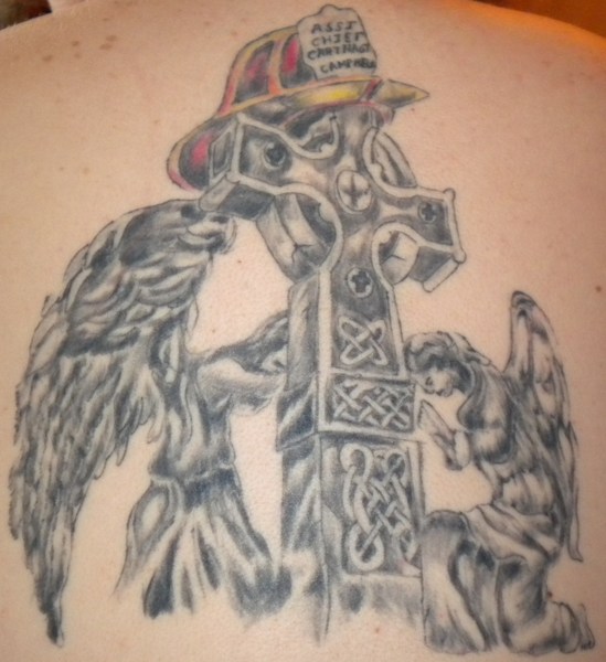Firefighter Helmet On Cross With Angels Tattoo Design
