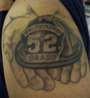Firefighter Helmet On Hand Tattoo Design For Half Sleeve