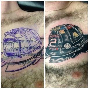 Firefighter Helmet Tattoo On Man Chest
