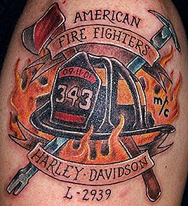 Firefighter Helmet With Banner In Flame Tattoo Design