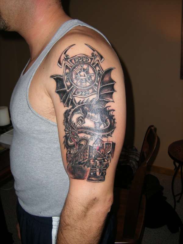 Firefighter Logo And Dragon Tattoo On Man Left Half Sleeve