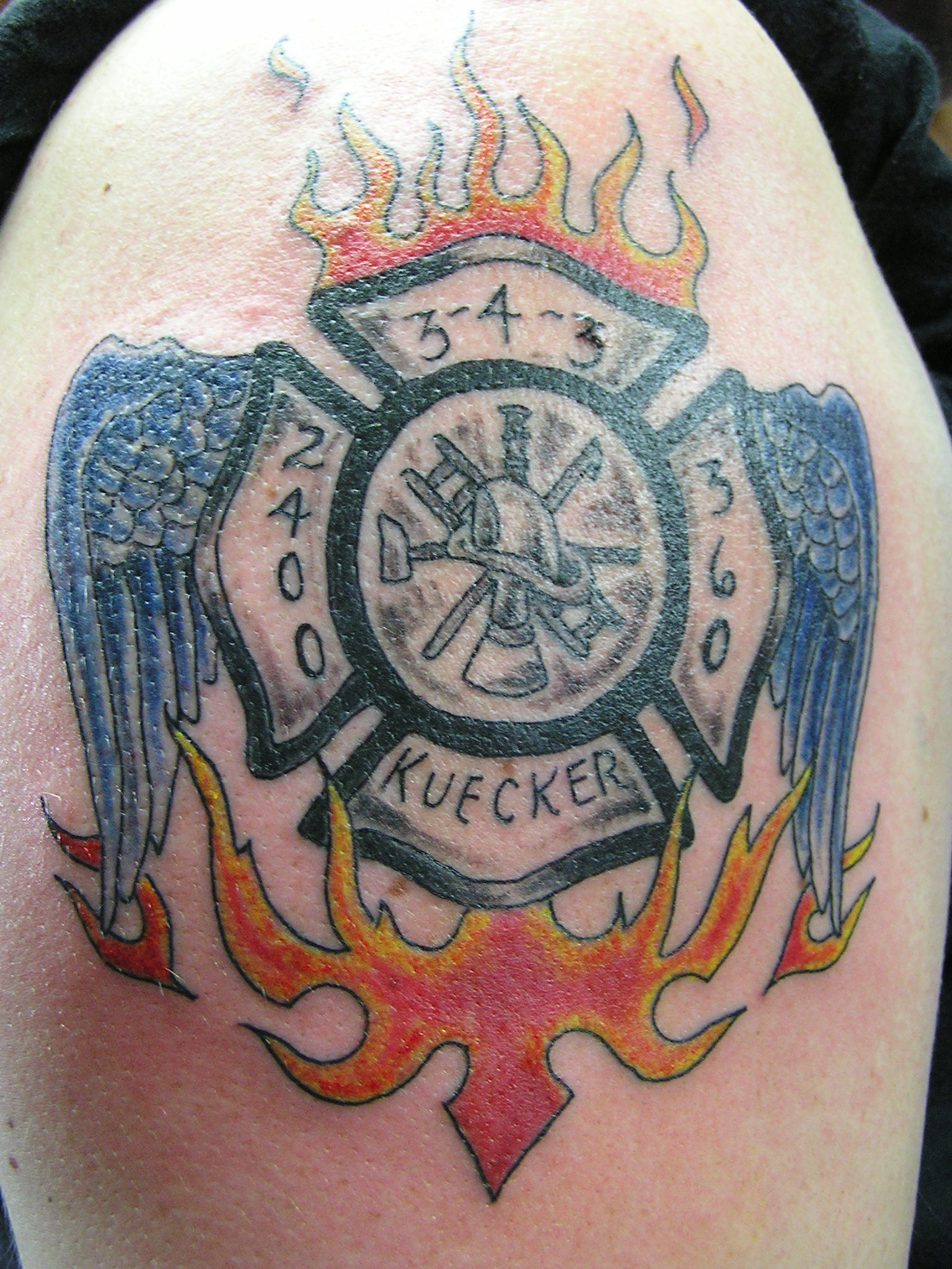 Firefighter Logo With Wings Tattoo Design For Shoulder