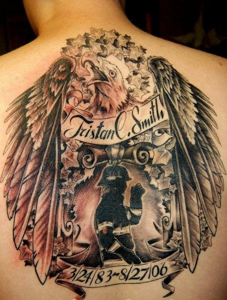 Firefighter With Eagle And Banner Tattoo On Upper Back