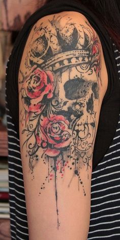 Floral With Skull Tattoo On Right Shoulder