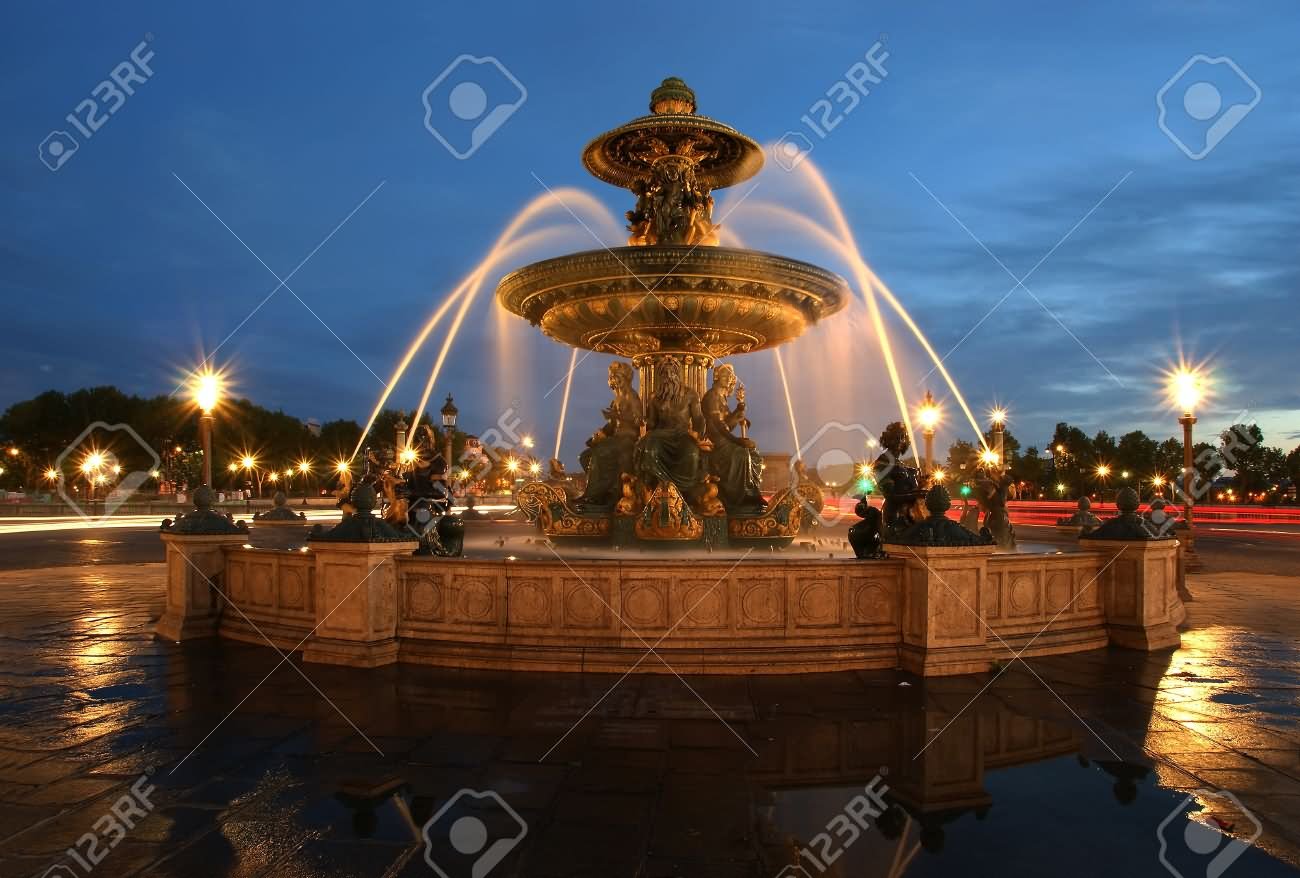 Fountain At Place de la Concorde In Paris At Night