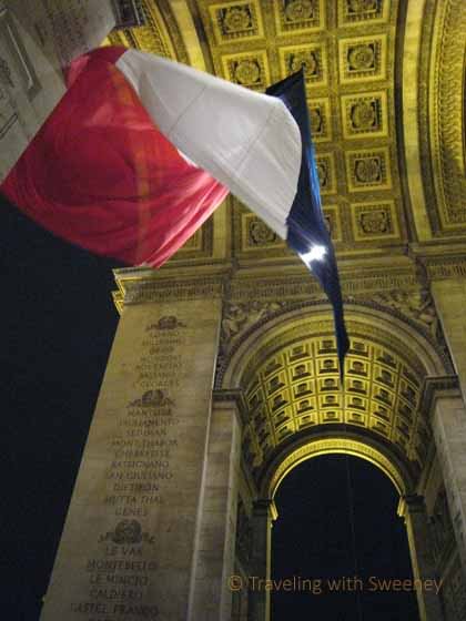 French Flag Waving Inside Arc de Triomphe